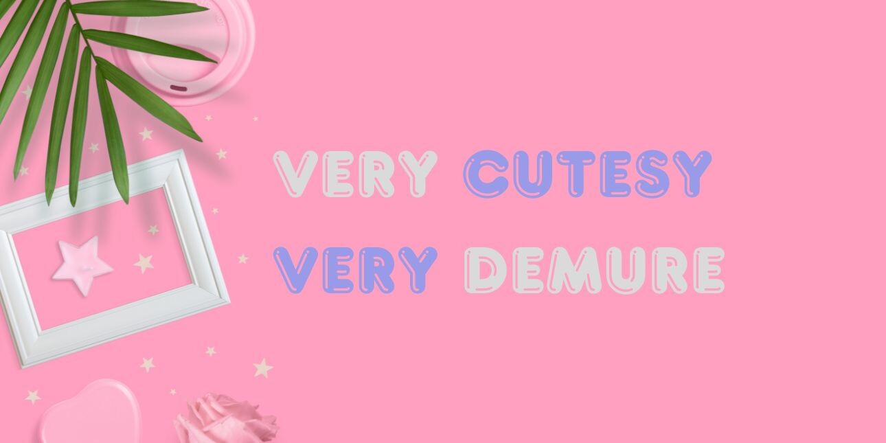 A bird's eye view of green leaves, pink coffee cup lid, pinks stars, pink heart, white picture frame and the words very cutesy very demure in a rounded typeface