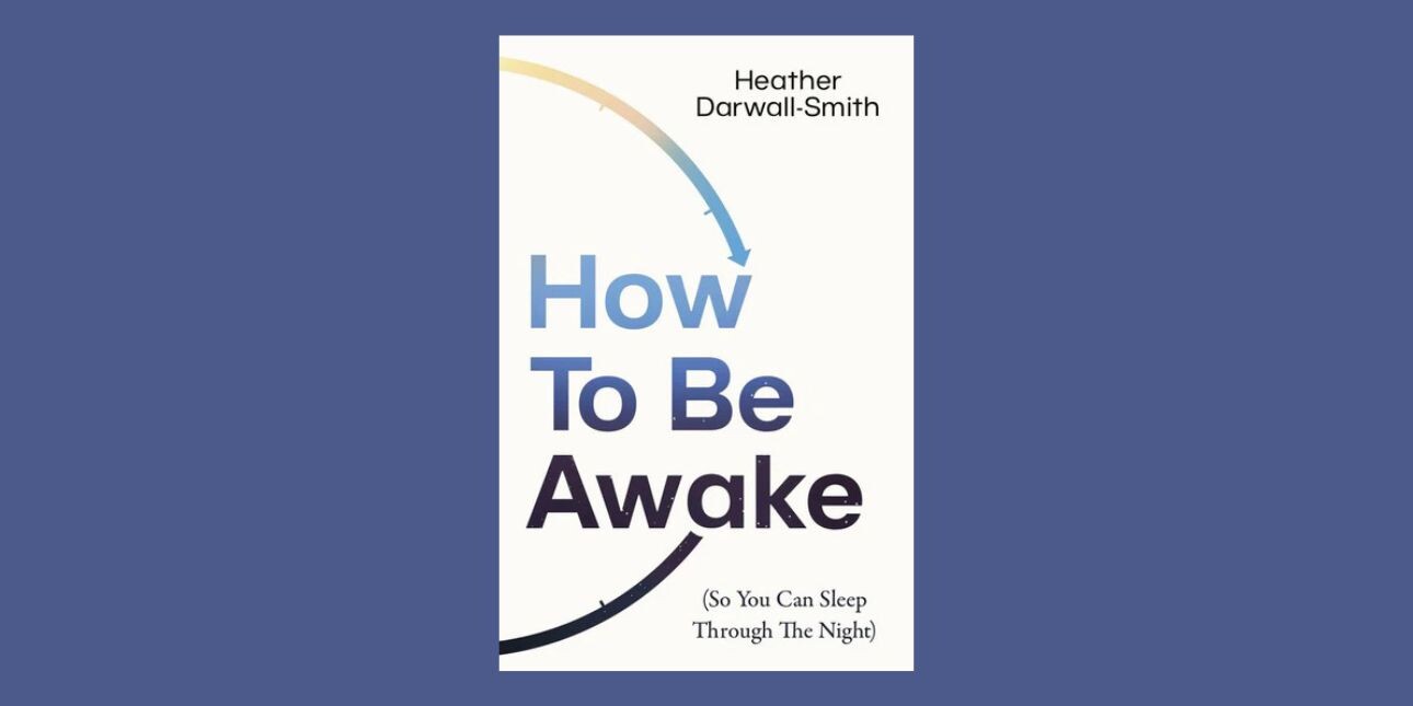 A white book with 'How To Be Awake' written on the cover in blue with the writers credit