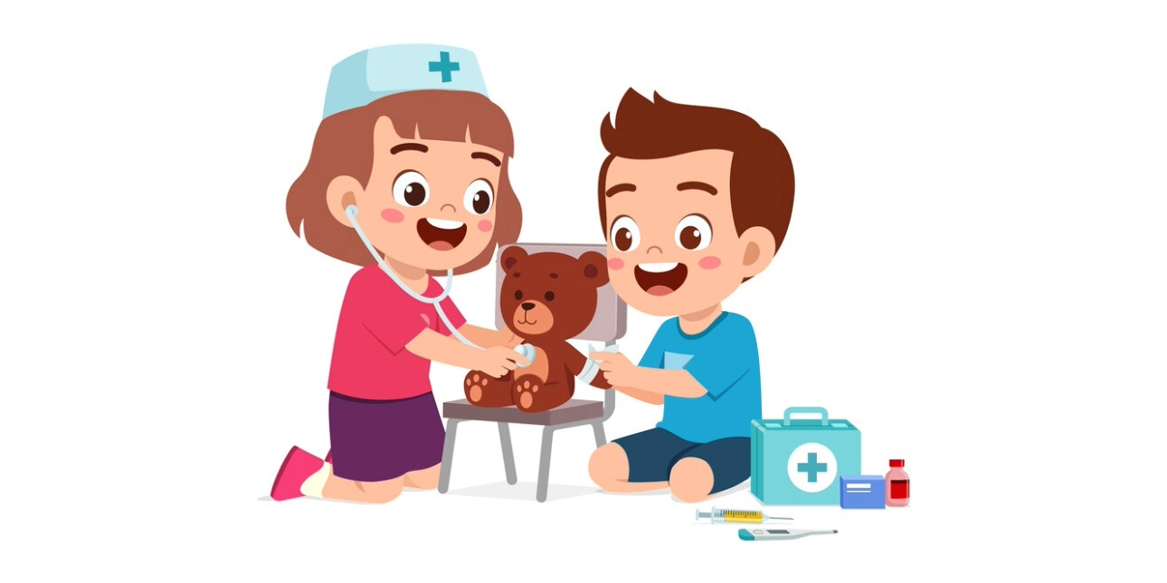 A cartoon illustration of a young girl dressed as a doctor while tending to a young boy's teddy bear. She wears a stethoscope and medic's hat. There are plasters and medical box around.