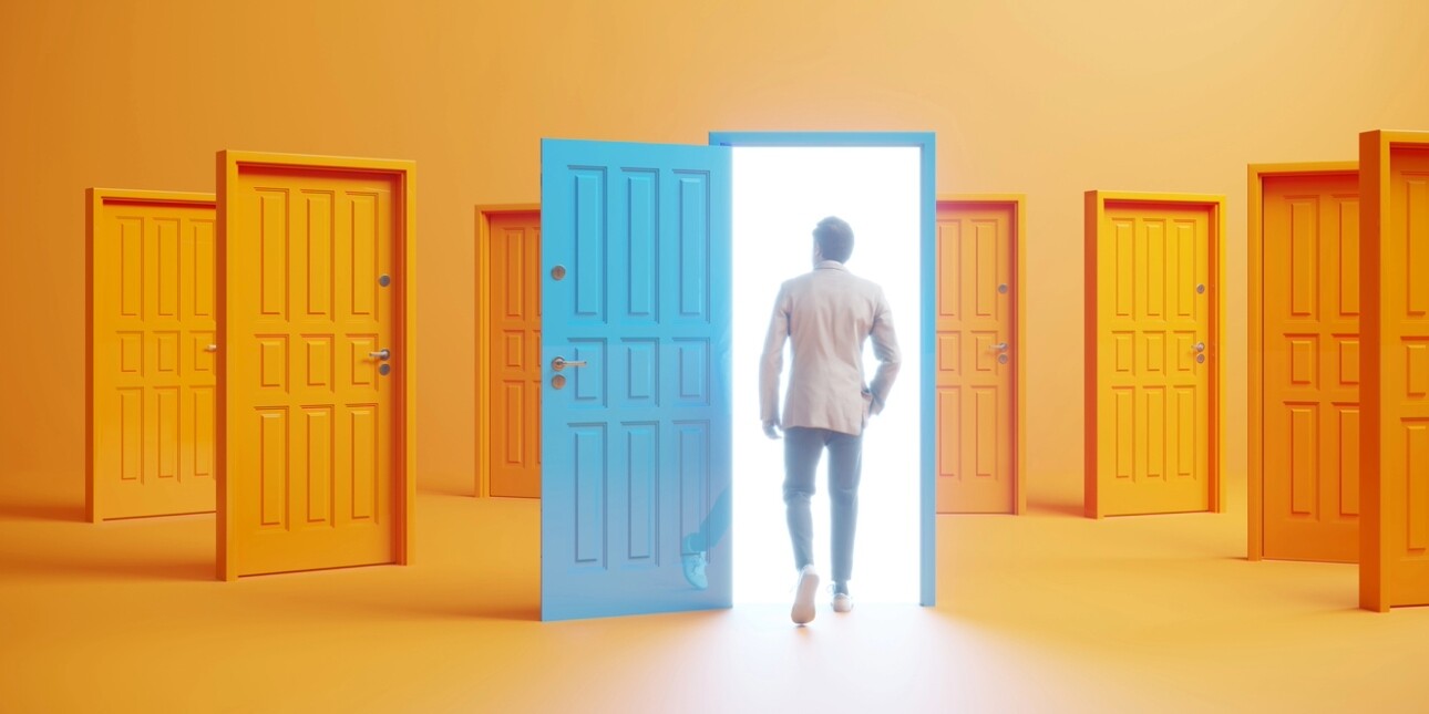 A digital image of a man who has chosen to walk through an open blue door instead of one of seven identical orange doors.