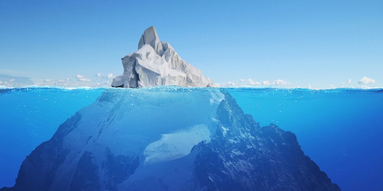 A graphic of an iceberg above and below the sea.