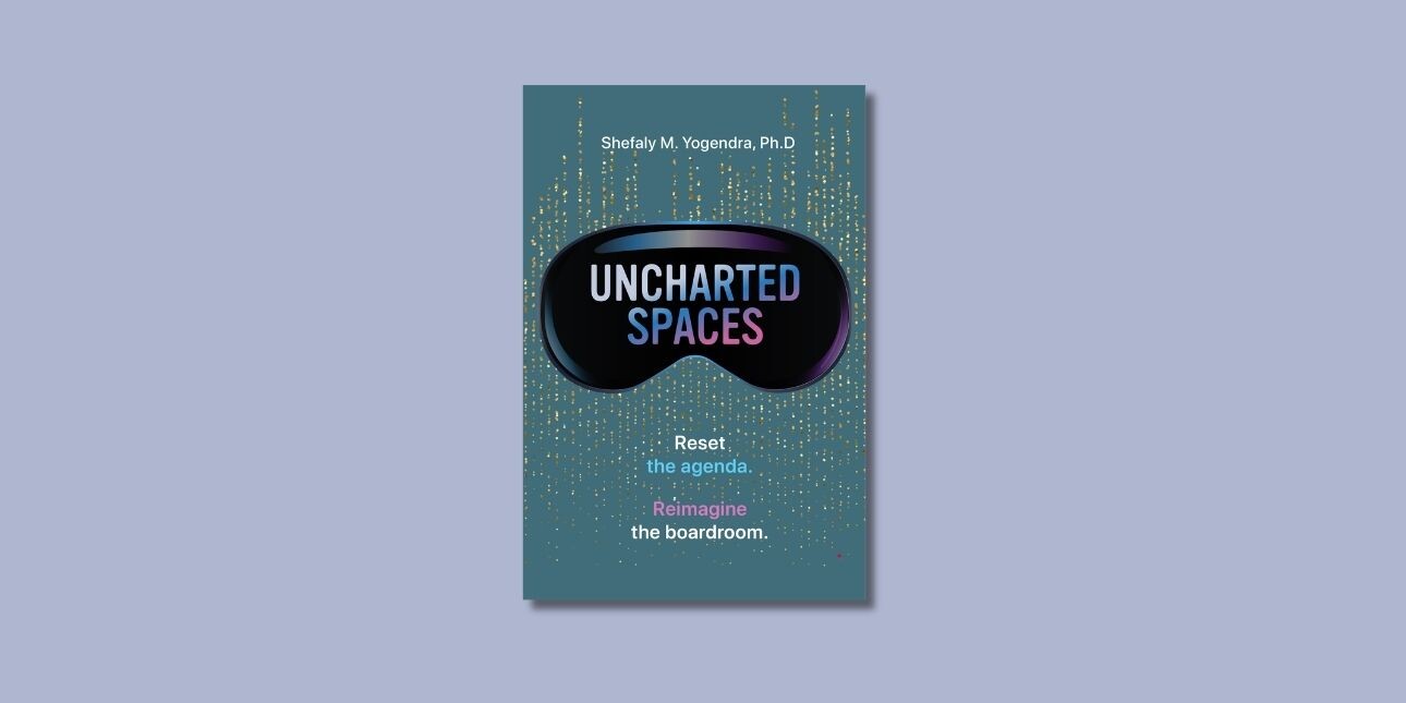 The teal coloured cover of Uncharted Spaces, featuring an eye mask in the centre with the title overlaid.