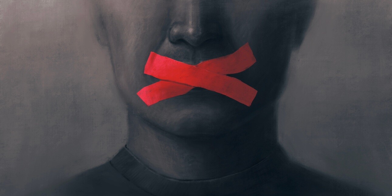 A black and white pencil illustration of a partially obscured face. Two bright red pieces of tape are stuck over the lips.