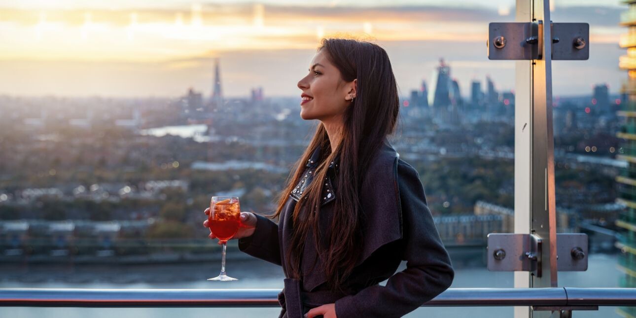 women drinking on roof top