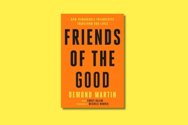 An orange book cover on a yellow background. The cover features the book's title and author in black and yellow text.