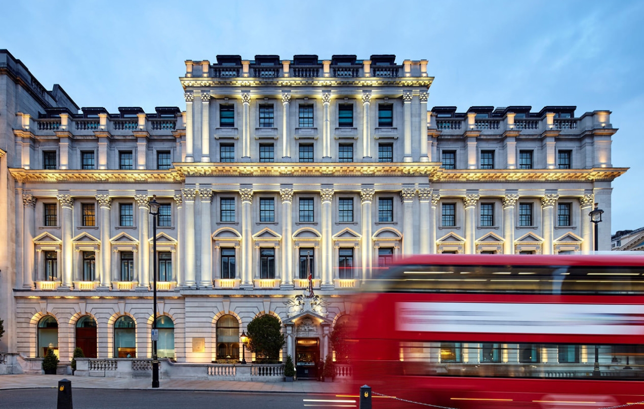 Sofitel London St James of with red London bus driving past