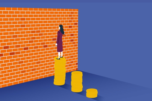 Illustration on a blue background showing a woman with white skin and long dark hair stood on top of three steps constructed from a stack of gold coins. She faces a large red brick wall