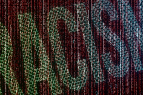 The word Racism constructed from binary code.