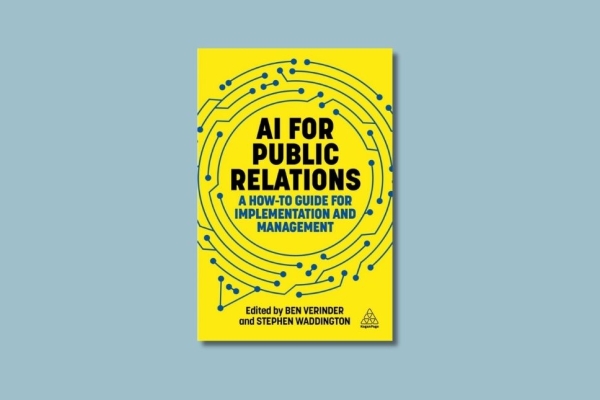 On an eggshell-blue background, the yellow book cover of AI for Public Relations A How-To Guide for Implementation and Management featuring a blue circular maze.