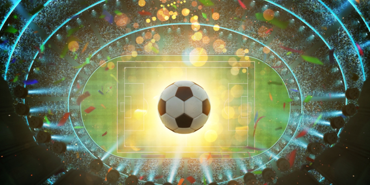 A bird's eye view of a football floating above a stadium