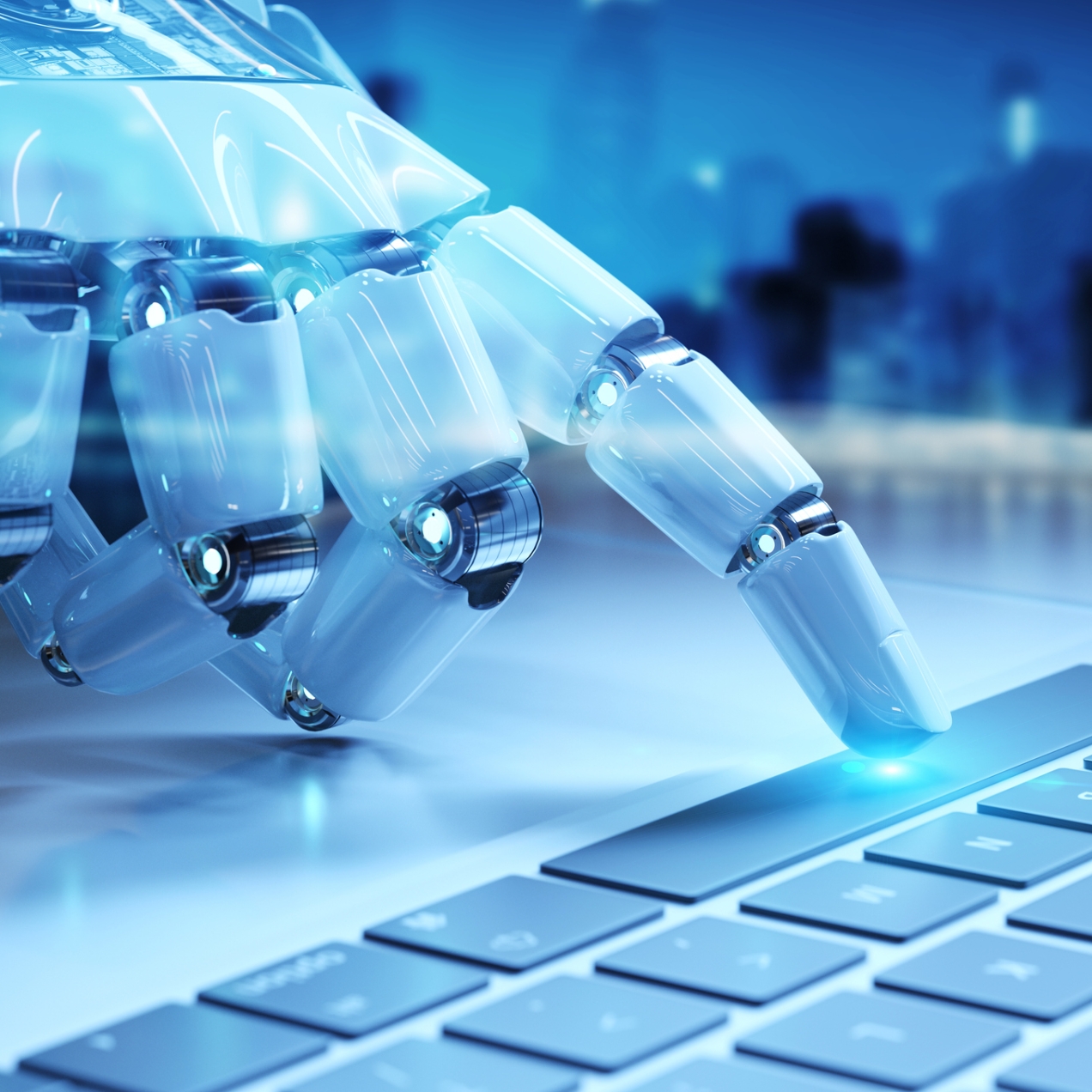 A finger from a robotic hand touches the space bar on keyboard