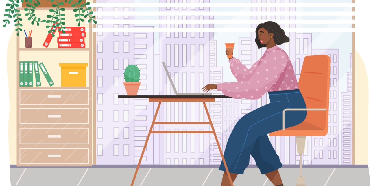 An illustration of Black woman sat at a desktop and working on a laptop. She holds a coffee cup in one hand. There are skyscrapers outside a window and shelves containing files to her left.