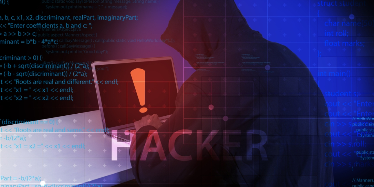 A figure of a hooded person leaning over a laptop. Written across the image are lines of machine code, a large exclamation mark and the word hacker