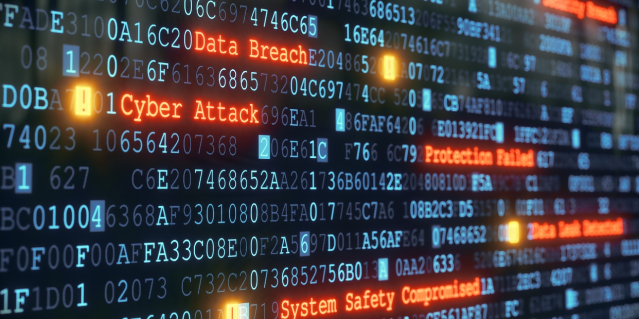Lines of random data on a screen with the words data breach, cyber attach and system safety compromised picked highlighted