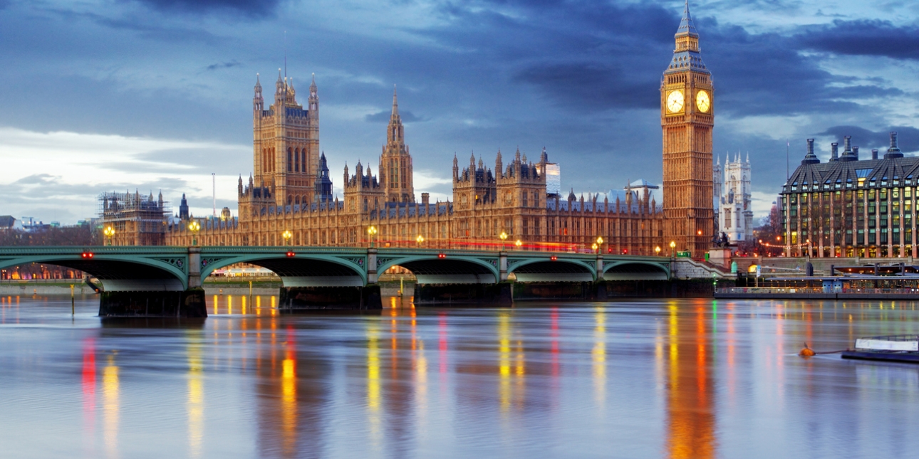 The British House of Parliament with Westminster Bridge and the river Thames in the foreground