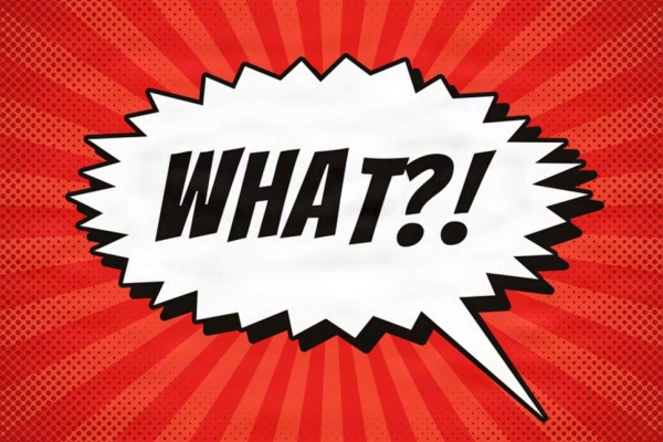 A white speech bubble on a red pattern background, which contains the word what?!