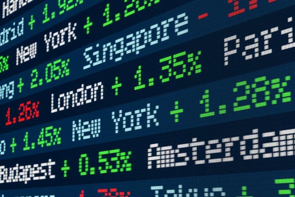A digital screen showing stock market data for different countries stock exchanges.