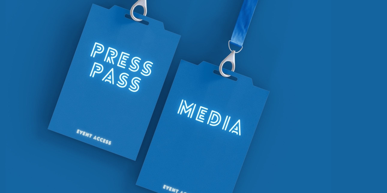 A computer generated image of two blue lanyards on a blue background with words press pass and media written on them