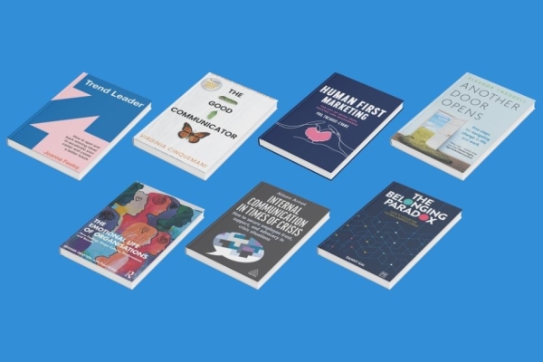 Seven books covers on a blue background