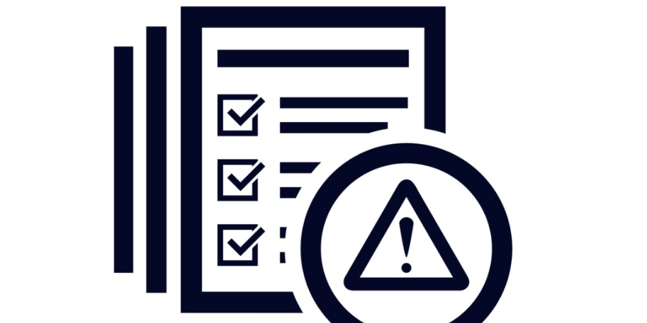 A monochrome icon featuring a paper checklist with tickboxes. This is overlaid in the right hand bottom corner by a circle. Inside this is an exclamation mark in a warning triangle