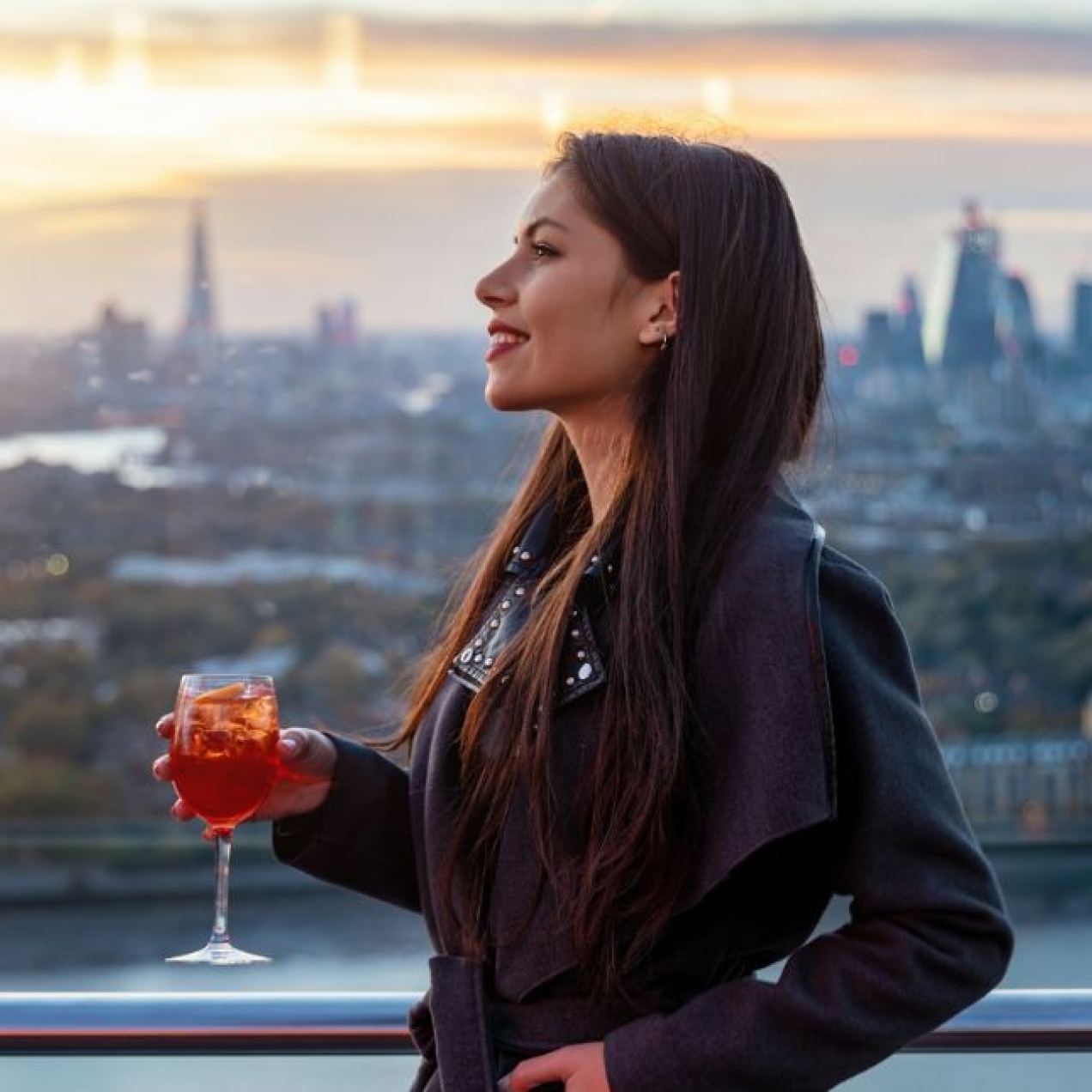 women drinking on roof top