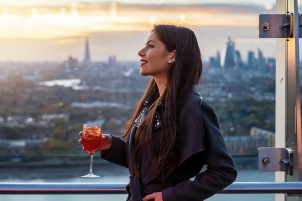 women drinking on roof top