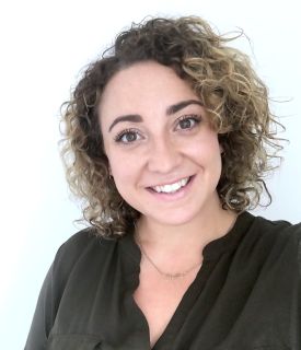 Stella Bayles smiling at the camera