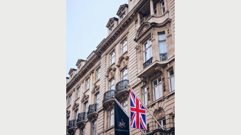 The historic exterior of the Welbeck hotel with two flagpoles flying the Welbeck and Union flags