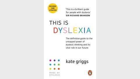 White cover of 'This is Dyslexia' written in mixed colours with accompanying text on the page
